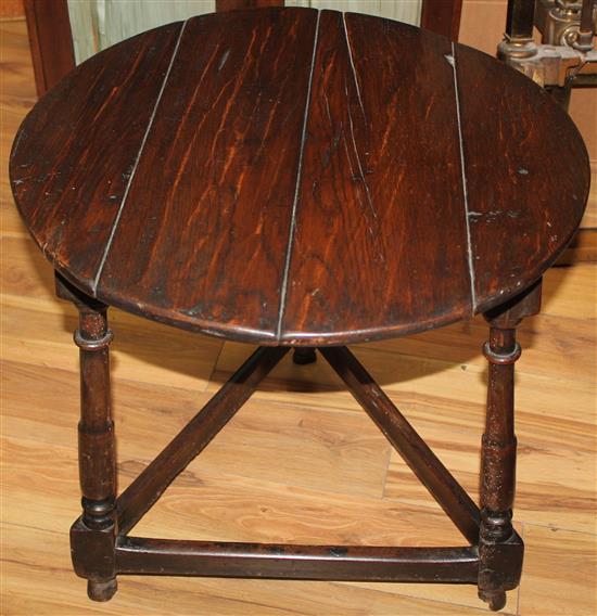 An 18th century and later oak and fruitwood cricket table, W.2ft 1in.